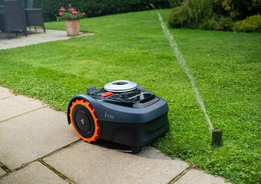 segway navimow no-wire robot mower meets an irrigation sprinklers