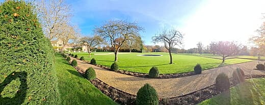 Panorama photo of the main lawn after a year